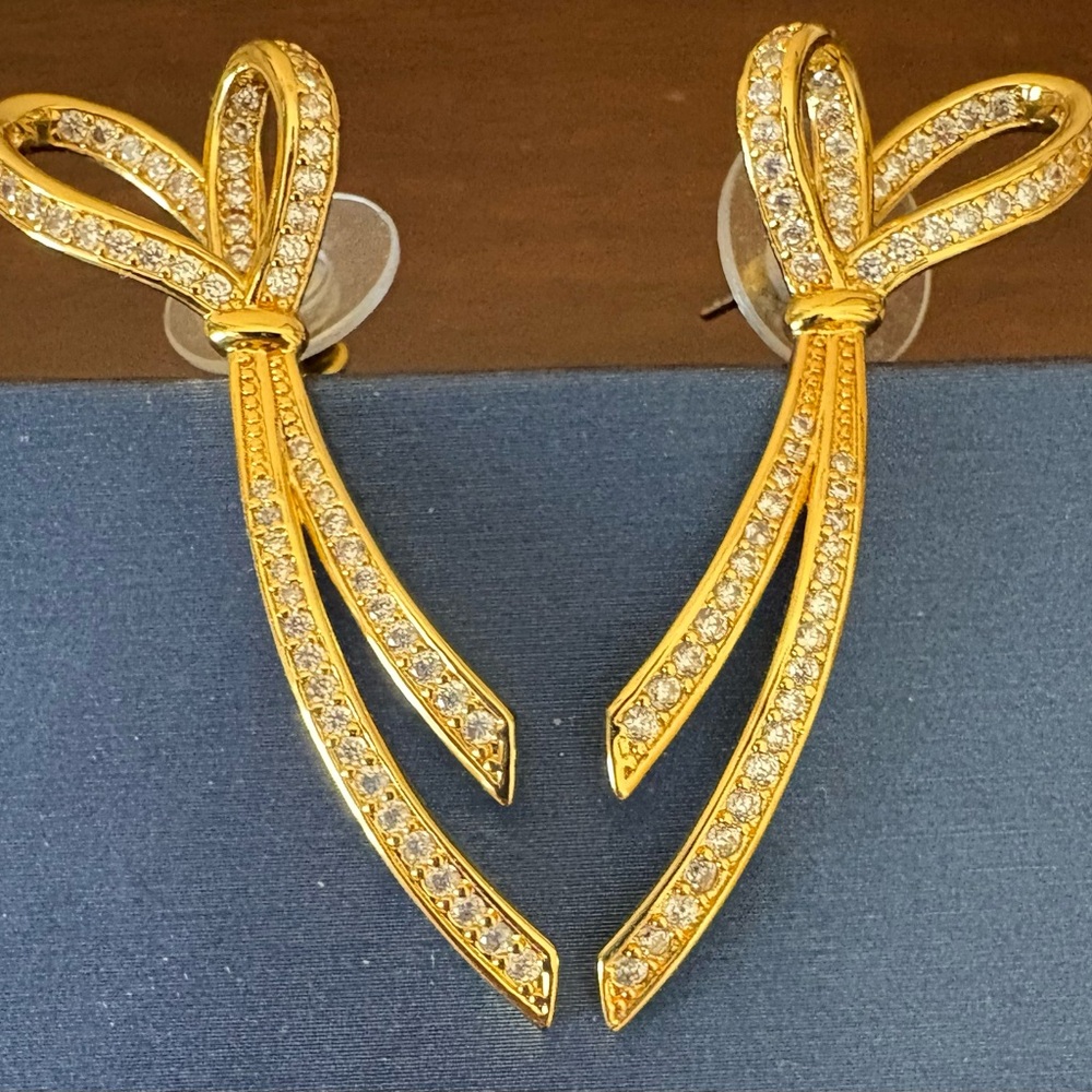 Never worn Gold Pavé Bow Earrings with Crystal Embellishments